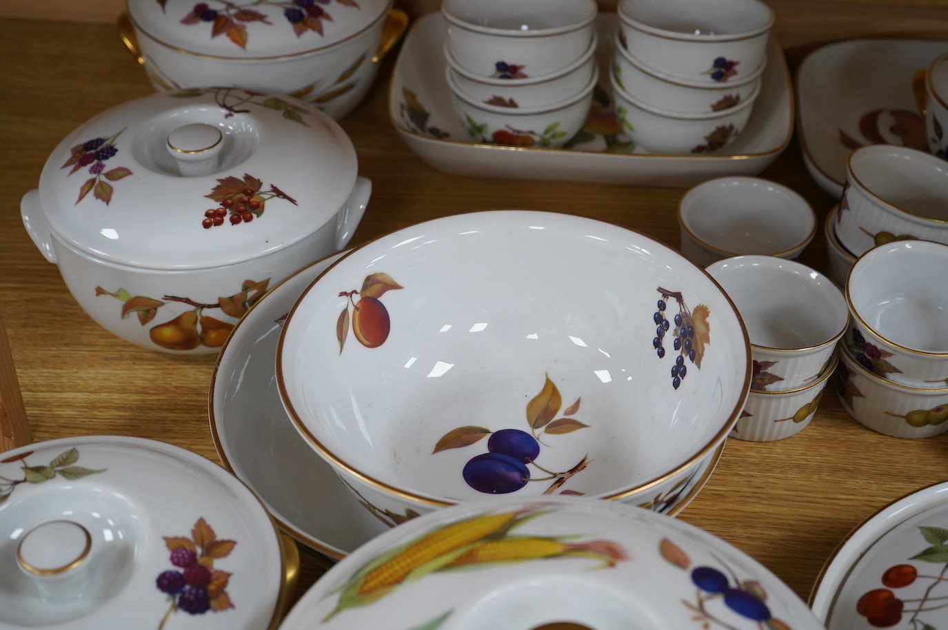 A collection of Royal Worcester Evesham dinnerware to include tureens, dishes and a sauce boat, largest 32cm wide. Condition - fair